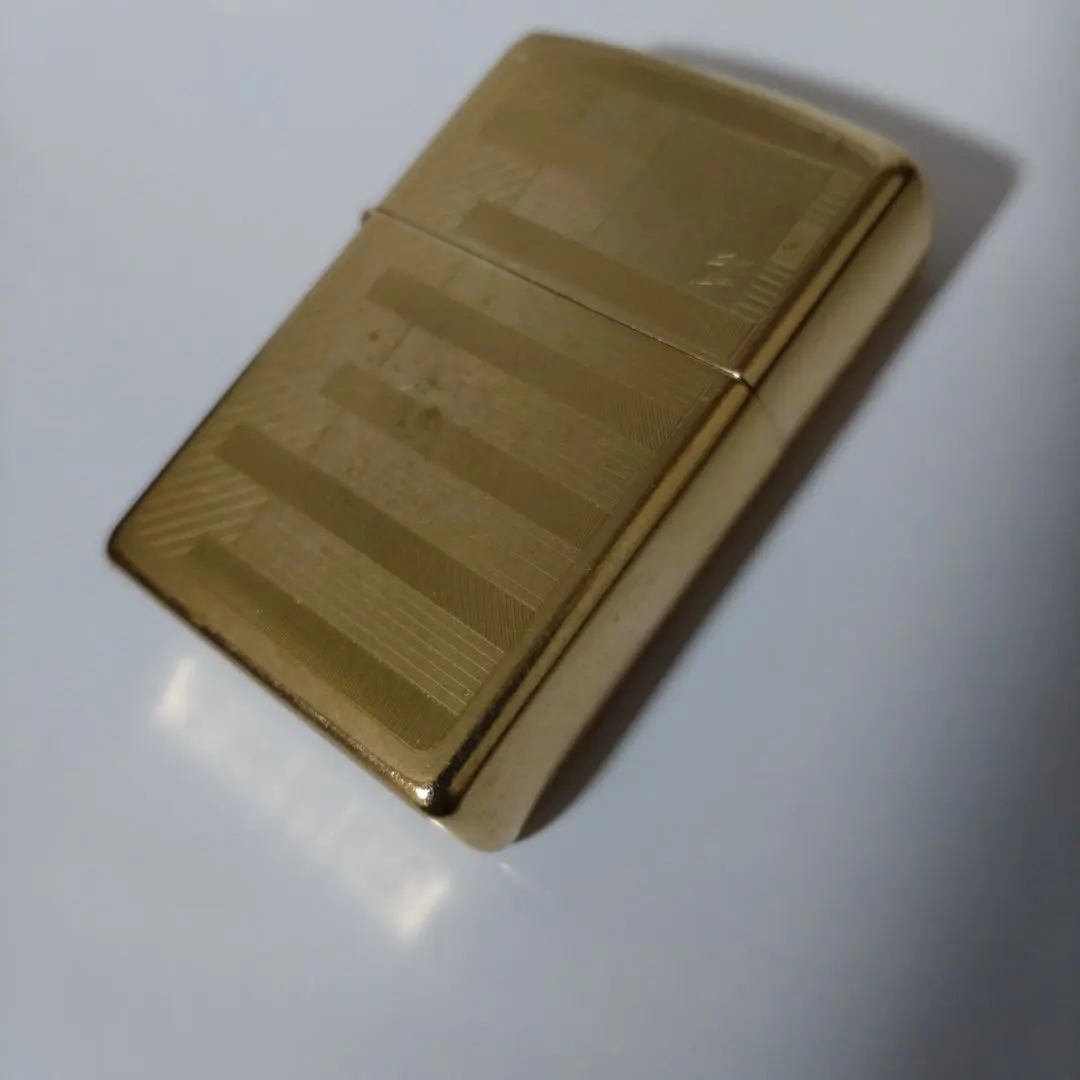 ZIPPOゴールド ストライプ模様 オイルライター