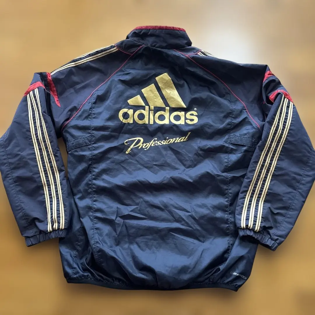 アディダス プロフェッショナル ウインドブレーカー O 紺×金×赤