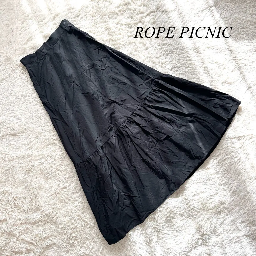 N4【ロペピクニック】ロングフレアスカート　ラップ風　黒　ナイロン　38 無地